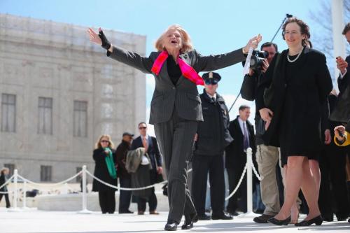 CORRECTION: This photo is not from today. It is from March, after SCOTUS arguments on the case. We regret the error. Lesson: Never trust Twitter, even if the tweet comes via a trusted newsman. But it’s still a neat photo, right?
Plaintiff Edith...