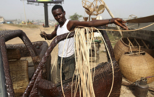 dynamicafrica:  theblackme:  Nigerian artisan Ojo Obaniyi from Ibadan has applied his skill in weaving in an unusually creative way to advertise his business. Obaniyi, who has practiced the craft for 20 years, has covered the interior and exterior of