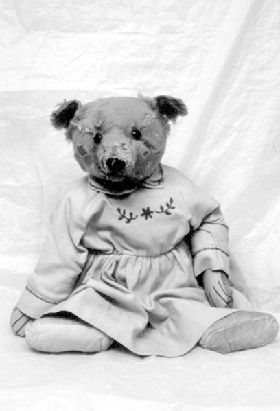 Teddy with deformed arms due to sixty years wearing the same dress, Museum No. Misc.566-1984. Photog