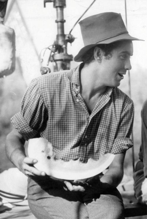 Tyrone Power eating a watermelon on the set of Jesse James, 1939