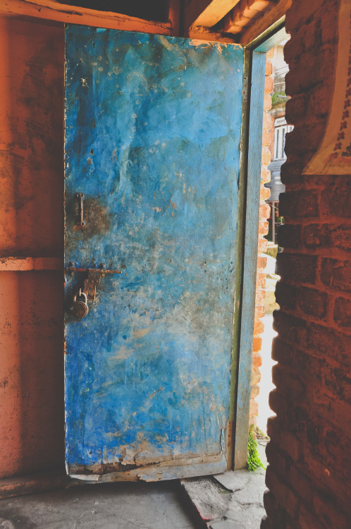 Door to the back room of “Tibetan”, best momo and buff fried rice place ever in Jawalakh