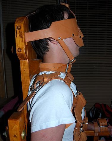 rubbermayhem:  It’s good to focus a boy’s attention by strapping him to a chair
