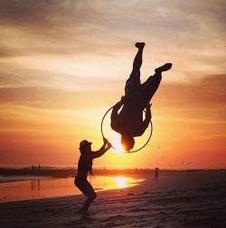 hoopingdotorg:  A mind blowing shot of Caroline Palmer and Gaston Schenone on the beach in Santa Teresa, Costa Rica. Photo by Lila Hasson. On Hooping.org. 