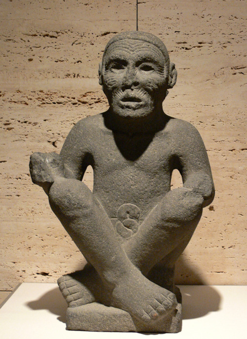 Aztec statue of a seated man, sometimes identified as the fire deity Huehueteotl.  Artist unkno