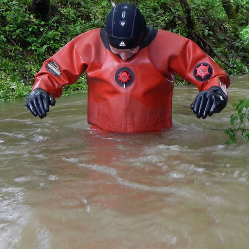 An old photo. I was standing in a river, and all of a sudden a heavy-duty rubber diver stood in fron