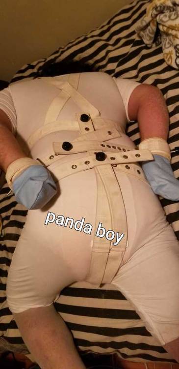 Extra layers and restraints for panda boy along with some mitts. Panda boy is feeling so good being 