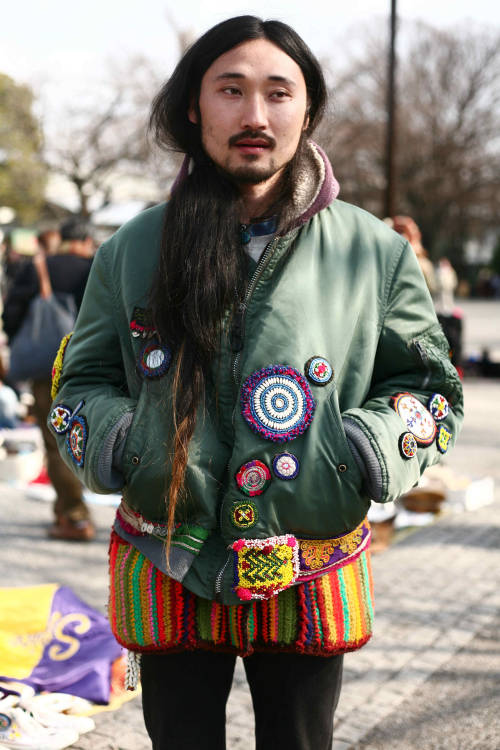 wgsn:  A folked-up MA-1 bomber jacket from our new gallery of Tokyo men’s street shots. Subscribers can see the rest of these photos here WGSN street shot, Tokyo 