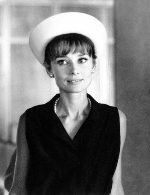 rareaudreyhepburn:  Audrey Hepburn and Anthony Perkins photographed by Pierluigi Praturlon at the Orly Airport in Paris, France, July 28, 1962.