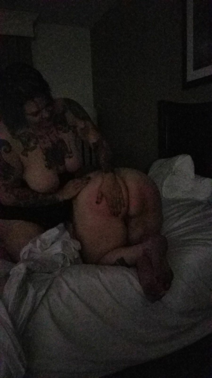 glitterdustedbitch:  Getting a good spanking from @punishedtattooedprincess and @thebeard81. Getting me nice and wet for daddy to fuck. @biggdaddy73