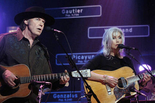 A Canadian drifter singing with Emmylou Harris.