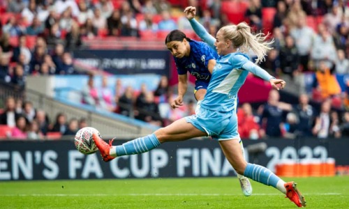 Sam Kerr scores a brace against Manchester City in the FA Cup final.First goal:Brother: What a goal.