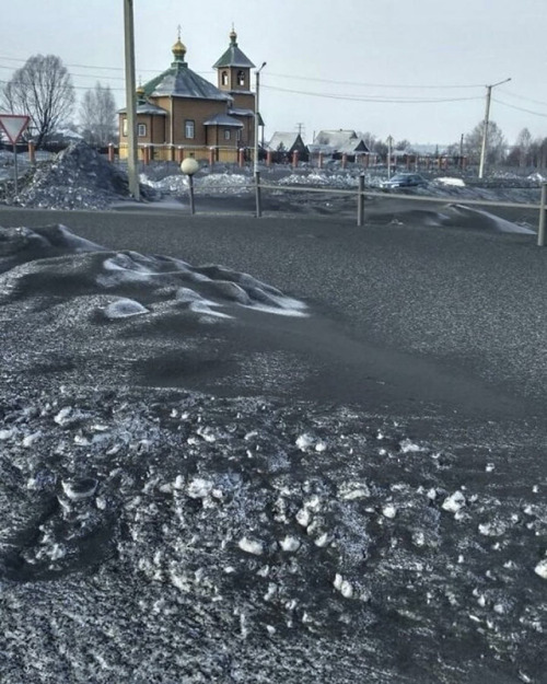 black snow in Siberia