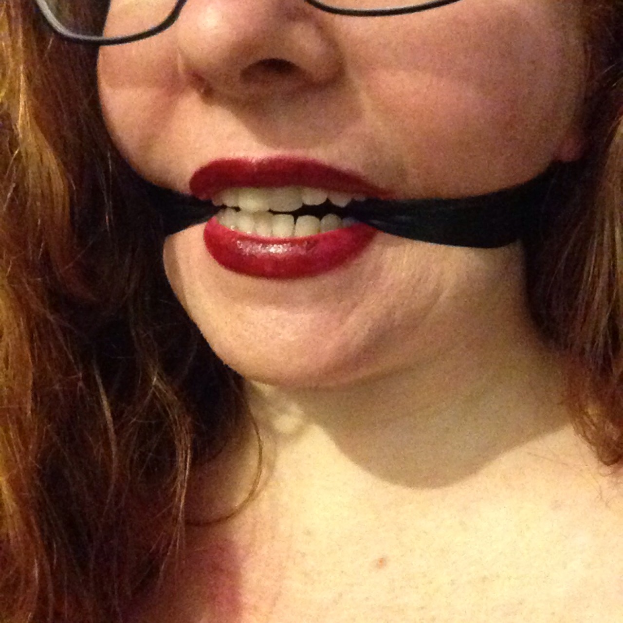 manic-pixie-ginger-slut:  A photo set of me donning the most restrictive tape gag