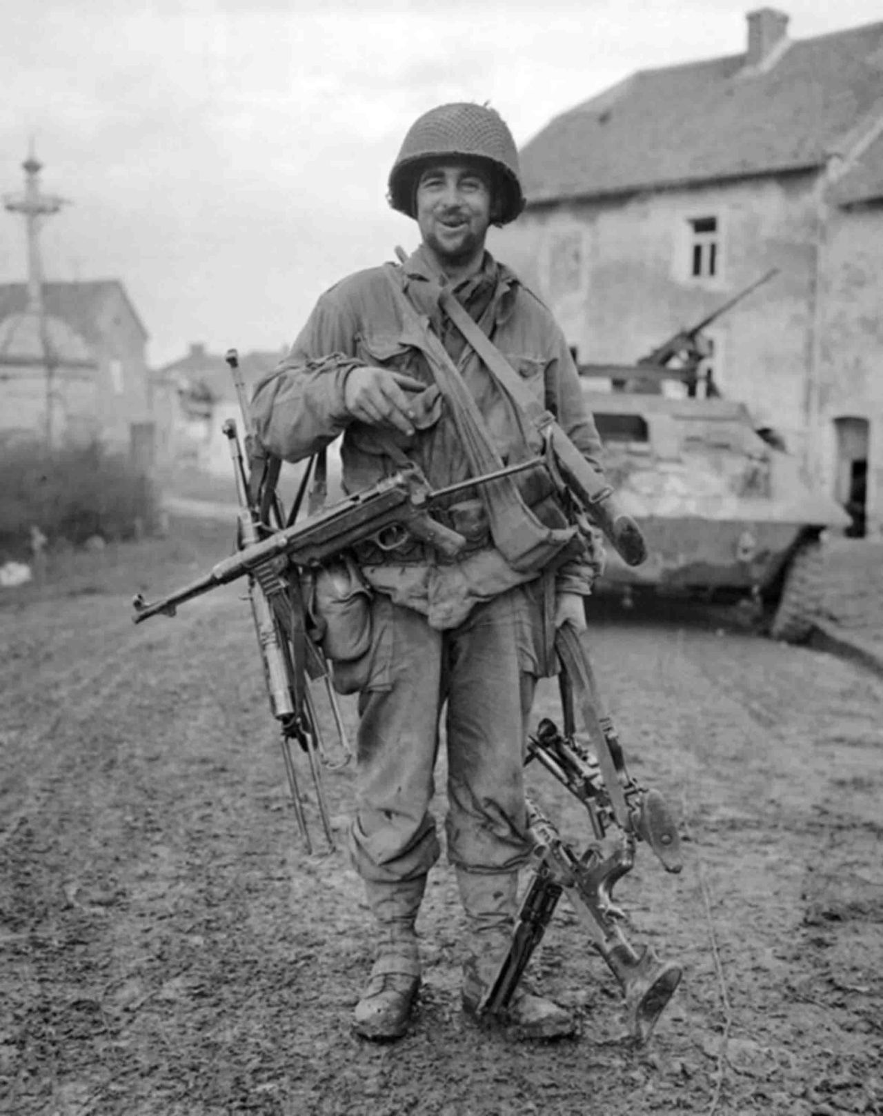 waffenss1972:  American soldier with German weapons - MP.40 and MG.34  