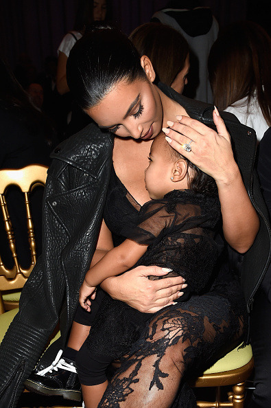 kimkanyekimye:  Kim & North at the Givenchy SS15 show in Paris 9/28/14  everything