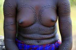 Amazing scarification on the body of a Mursi