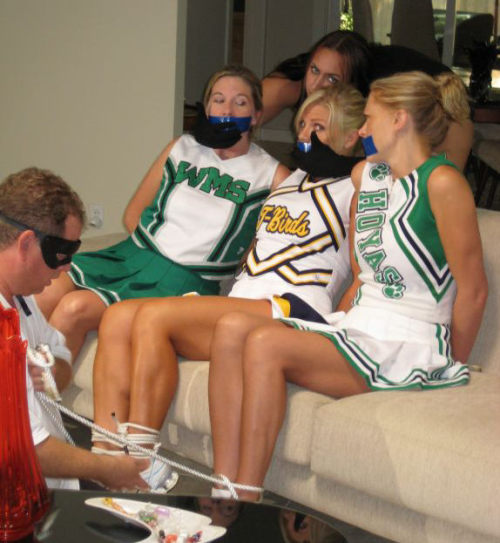 nowheretohide14:  Cheerleaders taking one for the team.