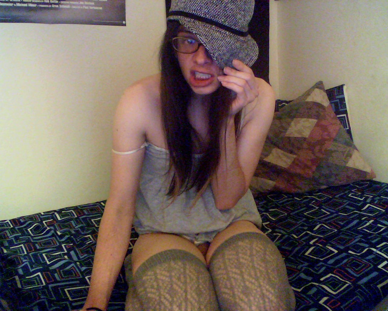 robo-trap:  Put on hat. Take same pictures all over again. Genius.   Like her smile