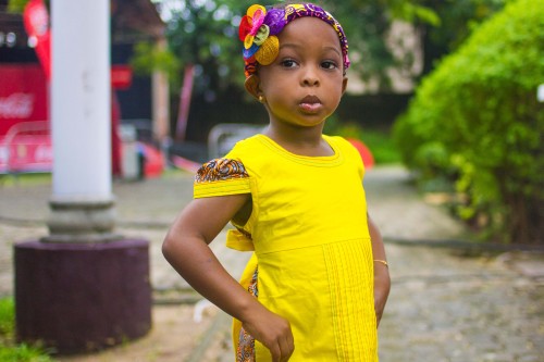 littleweavers:  On this rainy day in Lagos, she decides to pick her favourite yellow LW dress and po