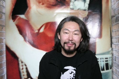 source Handsome Asian Albert Kuvezin is a guitarist, throat singer, and leader of the Tuvan band Yat