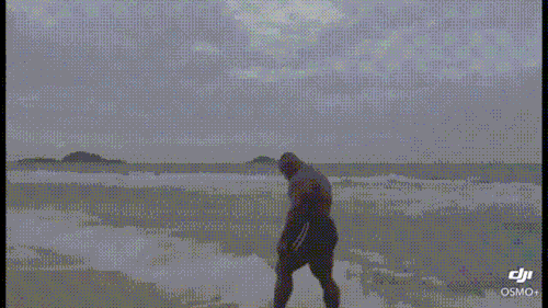 blackonyxstone:Akim walking on the beach