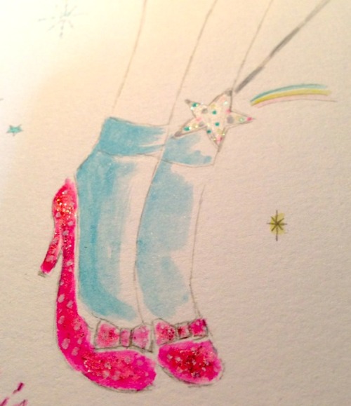 close up of dorothy’s ruby shoes. glittering shoes and star stick♥︎