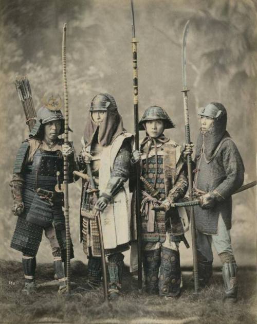 Colored photo of Japanese Samurais, with bows and arrows, helmets, swords.Japan, place unknown, circ