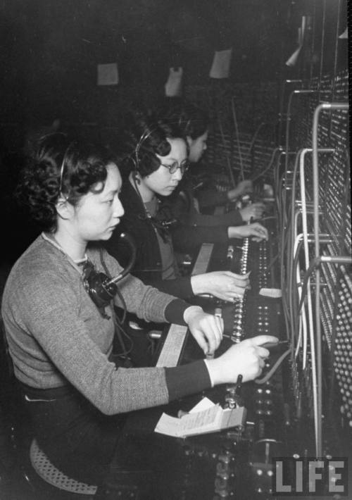 Chinese telephone operators working at the switchboard in the Pacific Telephone Chinatown branch in 