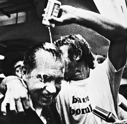 Baseball player Bobby Grich pours beer over Richard Nixon after the Angels win their first ever division title. Los Angeles. September 1979.