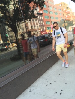 nychotguys:  Checking himself out on 6th Avenue, NYC.Thanks everydayhotness.