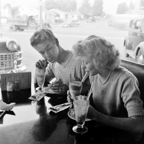 coffeedirt:  1950s teenage couple order milkshakes and burgers at a local San Diego