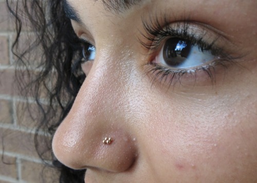 Healed nostril piercing with rose gold jewelry by BVLA