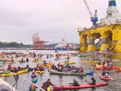 peterfromtexas:Irony in SeattleProtesters in Seattle trying to stop an oil drilling platform on it’s