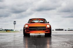 redlinerevs:  This 240z has a “Godzilla-spec heart transplant” from a R33 Nissan Skyline GT-R with a ton of customer fabrication. Click here to read the article by Modified, and here to check out the build thread 