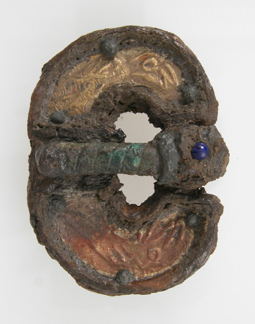 Buckle, Medieval ArtMedium: Iron, gold foil, copper alloy, glass cabachon, tinned or silvered backGi