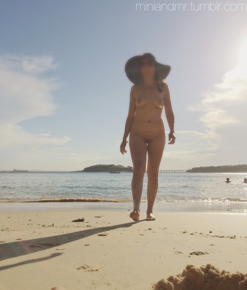 miniandmr:  My first time at a nudist beach today! I was completely naked surrounded by other men and couples really close by.  At first i just lay face down on my towel, first taking my bikini top off then the bottoms too, completely nude I layed face