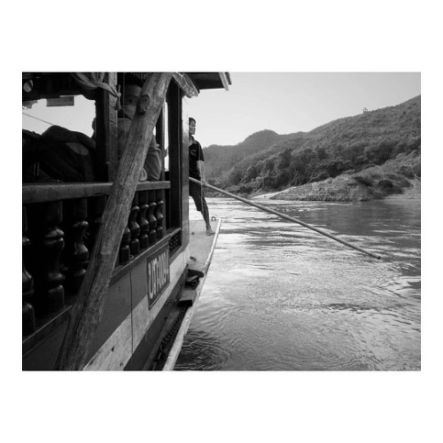 Mooring the slowboat, Laos