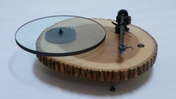 wickedclothes:  Handmade Wooden Turntable This turntable is made from a slice of a tree! Sold on Etsy.     I seriously want this