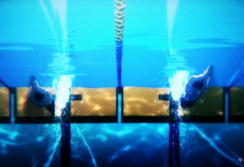 tottorin:  Free! Season 2 PV Caps — a gratuitous rainbow, sakura trees blooming in the background, a scene of Rin and Haruka swimming.  
