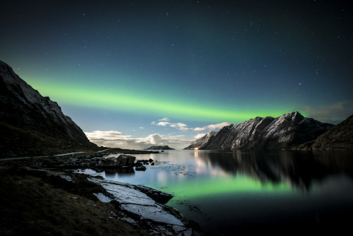 el-mo-fo-to:  one crazy night | lofoten, norwayArtist: Lorenzo Montezemolo | [tumblr || instagram]In Feb 2014, I took my first trip to Norway’s Lofoten archipelago. We were there to shoot snowy landscapes during the day and the northern lights at night.