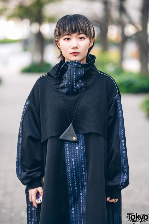 19-year-old Rino’s minimalist futuristic street style in Tokyo with a binary code print cowl n