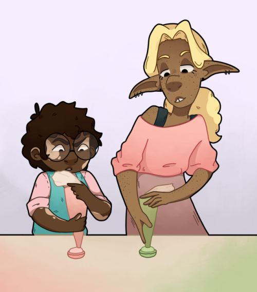 galaxiuu:macaron boys!! [image description: a drawing of Angus and Taako, standing behind a counter 