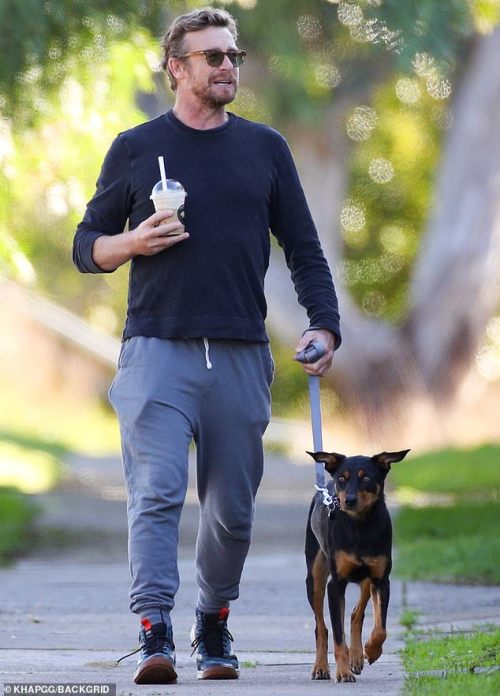 Simon with his daughter Stella walking his dog in Sydney, june 14 2020