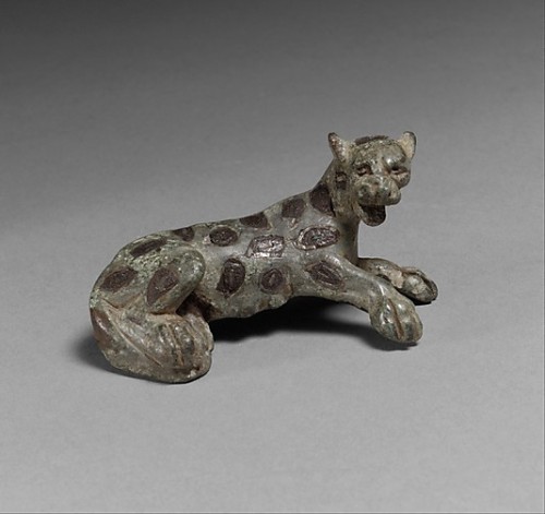 ancientpeoples:Copper brooch of a panther Its spots are inlays of silver. It is 3.4cm high and 6.3cm