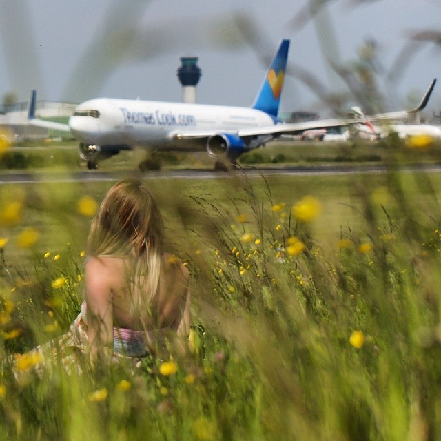 Girl spying on an aircraft