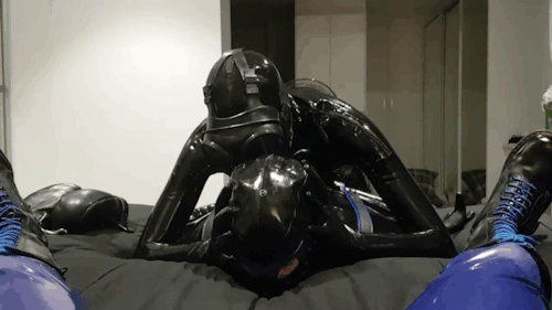 rubberlovinggent:  Scenes from my latest video, had two gimps to play with, thought it might be fun to let them at each otherLink to vid: https://www.xtube.com/video-watch/two-horny-latex-gimps-fucking-one-another-in-gear-35023031