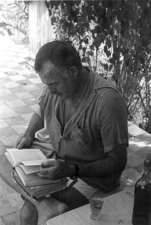 papertownbooks:  Ernest Hemingway reading. adult photos