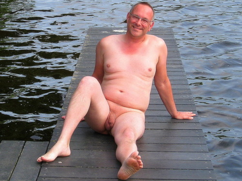 averagedudenextdoor:  Pale uncut dude who shaves his whole body, enjoying some naked time on the dock