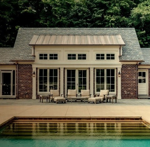 Brick Exterior In ChicagoInspiration For A Large Timeless Brown One-story Brick Gable Roof Remodel
