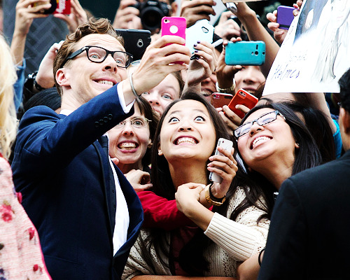 benedictdaily:Benedict Cumberbatch with fans at ‘The Imitation Game’ premiere during the 2014 Toront